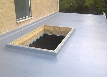 Fibreglass flat roof in South Wales with opening for skylight.