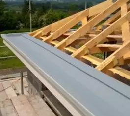 Fibreglass gutter lining on new building in Chepstow Wales.